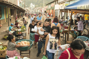People at an outdoor market in El Salvador