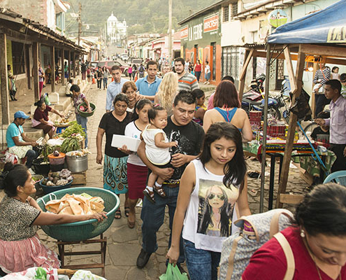 People at an outdoor market in El Salvador
