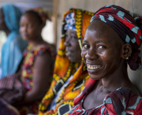 Women wait to receive sexual reproductive health services and counseling at a mobile clinic in rural Senegal