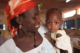 Mother smiles at her baby girl