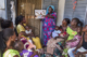A community health worker provides women in her community counseling and post natal care at her home