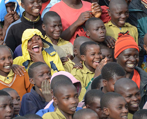 Crowd of boys laughing