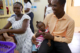 An expectant mother arrives at an ANC consultation with her young daughter and husband