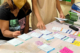 Two women working with the Contraception Discontinuation Testing Toolkit
