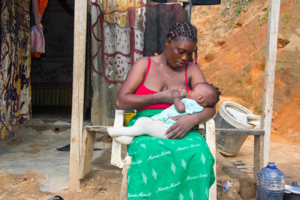 Congolese mother breastfeeding her baby