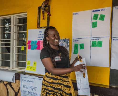 A university student participates in a co-design workshop in Rwanda
