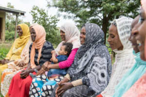 Several Ethiopian women participate in a group conversation on family planning