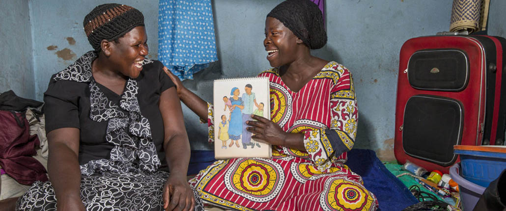 Community health worker provides family planning and contraceptive counseling during a home visit in Uganda