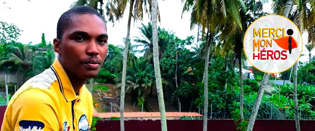 Screenshot of a man being interviewed in a Côte d'Ivoire Merci Mon Hero video