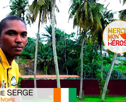 Screenshot of a man being interviewed in a Côte d'Ivoire Merci Mon Hero video