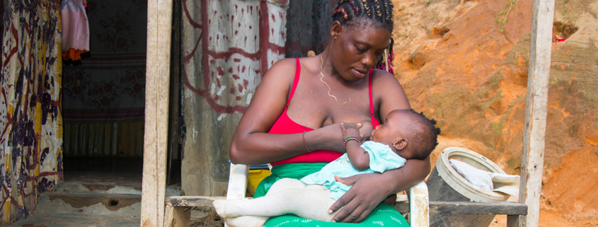 Congolese mother breastfeeds her baby