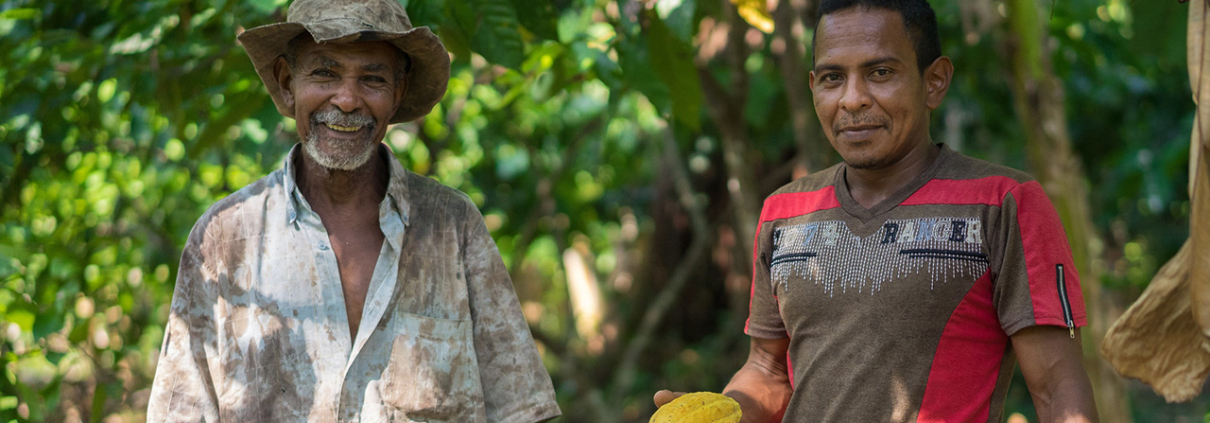 A father and son on their farm in Colombia