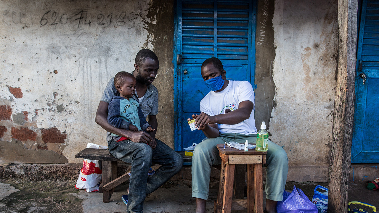 A feverish child is treated by the community relay