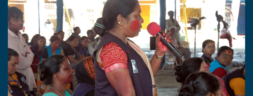 An Indian woman speaks at the All India Conference of Entertainment Workers
