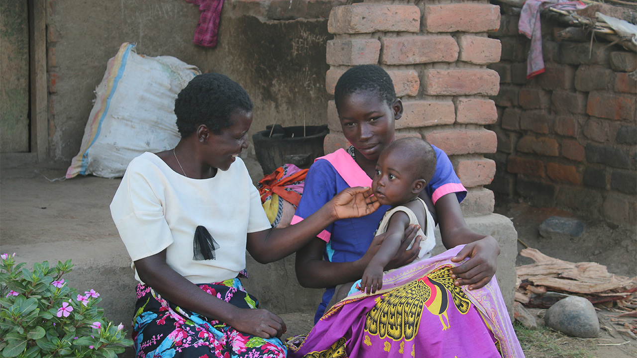 Young mother with her mother and baby