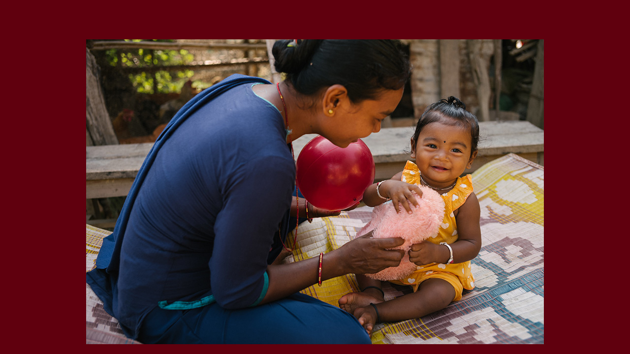 A Nepalese mother and her daughter play