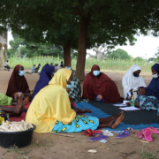 Women gather outdoors in Nigeria