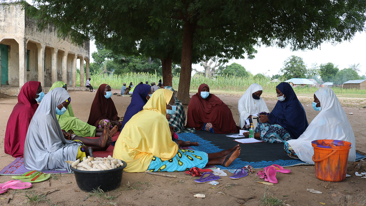 Women gather outdoors in Nigeria