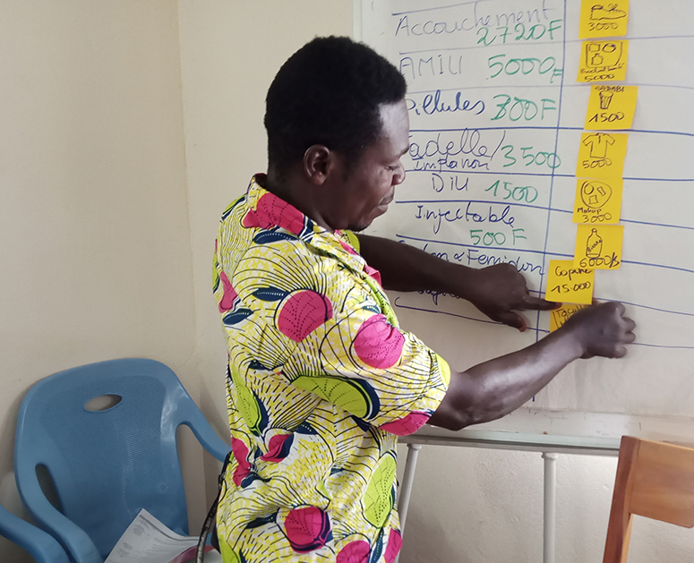 A male community leader during the Cost Comparison activity in Togo.