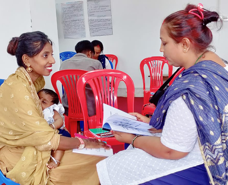 Adolescent mother and health care provider during Empathways activity in Nepal.