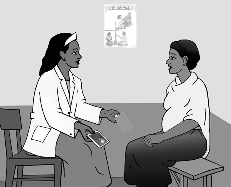 Mother makes time to speak with a healthcare worker.