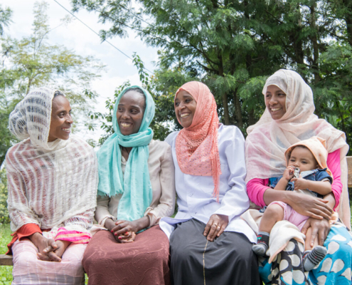 Four women participate in a family planning (FP) discussion at Buture Health Post in Ethiopia.