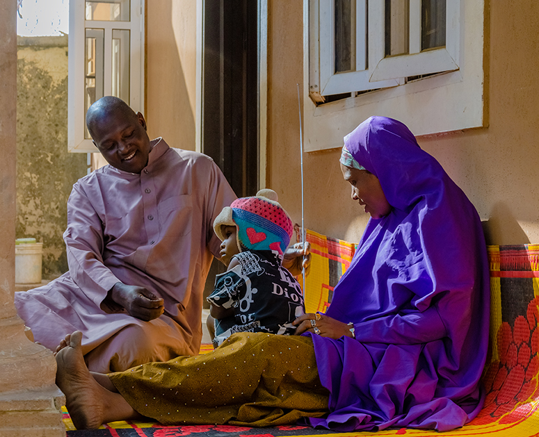 Parents with their baby in Bauchi State, Nigeria