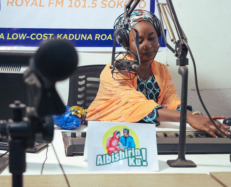 A Nigerian radio personality during a call-in program