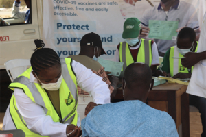 Man receiving the COVID-19 vaccine in Nigeria