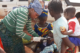 Baby getting the malaria vaccine in Guinea