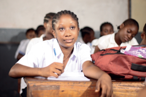 Adolescent girl in a classroom in the DRC