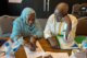 Training participants working in small groups in Niger
