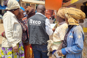 A RECO interacting with community members in the DRC